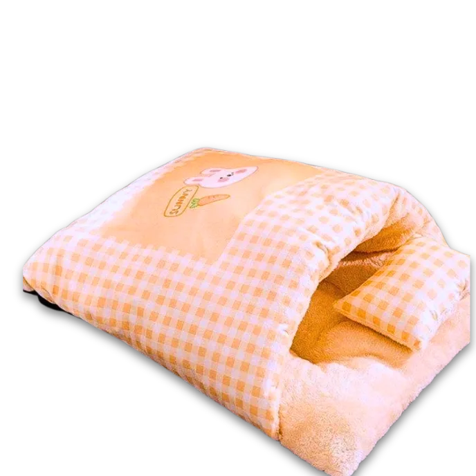Checkered pet bed with a cartoon cat design on a white background