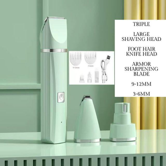 Mint green electric shaver with attachments on a light green background