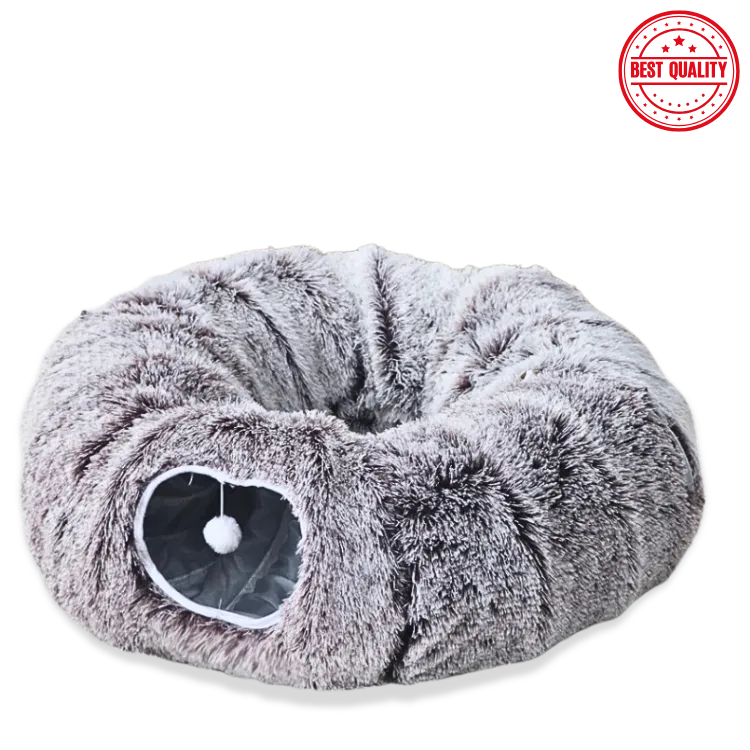 Fluffy gray pet bed with a white ball on a white background, labeled 'Best Quality'.