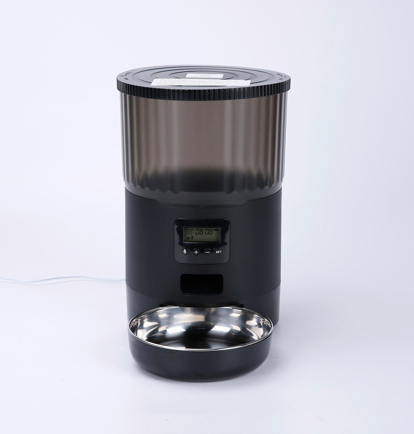 Black pet feeder with a digital display on a white background