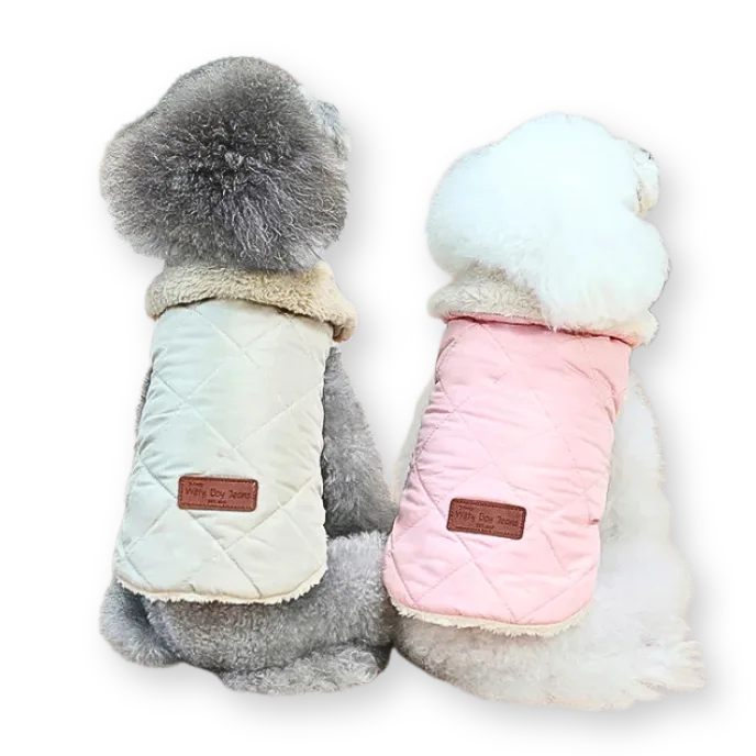 Two dog coats, one gray and one pink, on a white background.