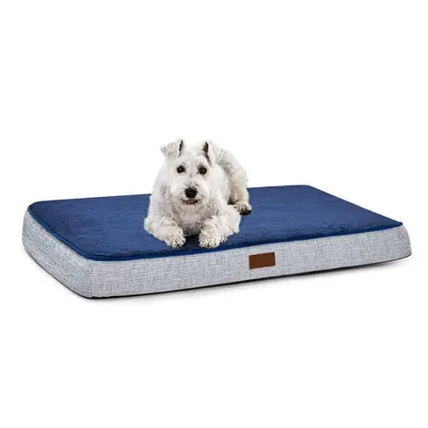 A dog lying comfortably on a PawVortex blue and gray orthopedic pet bed, demonstrating its supportive and plush design for joint health in usa.