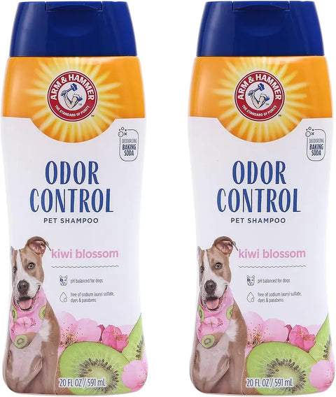 Two 20 fl oz bottles of Arm & Hammer Odor Control Pet Shampoo in Kiwi Blossom scent with baking soda formula.