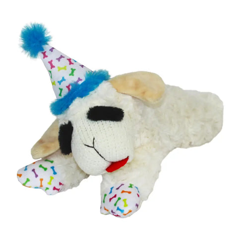 Birthday edition Lamb Chop dog toy wearing a white party hat with blue trim and bone patterns.