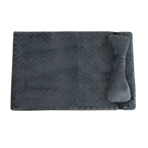 Black pet bed with plush textured pillow for sophisticated and cozy resting