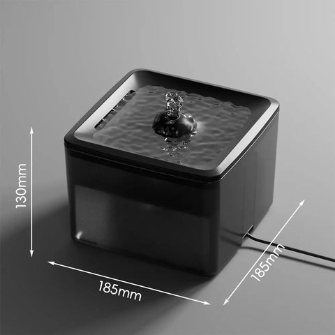 Product dimensions diagram for the black pet water fountain showing 185mm by 130mm size.