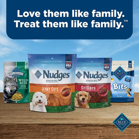 A variety of Blue Buffalo dog treats including Nudges Jerky Cuts, Grillers, Wild Bits, and training Bits.