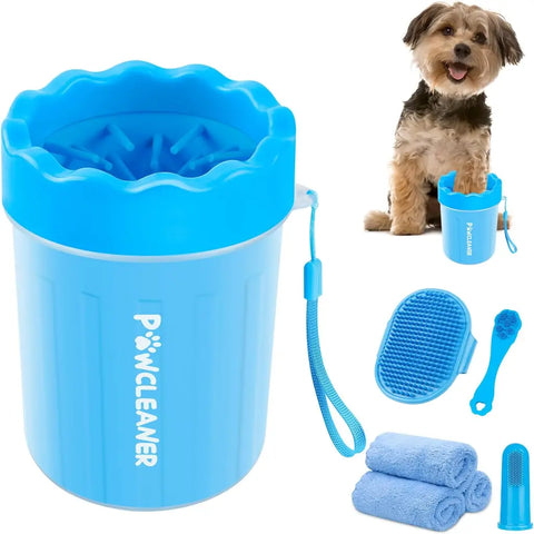 Blue portable dog paw cleaner cup kit displayed with a small breed dog and bath accessories.