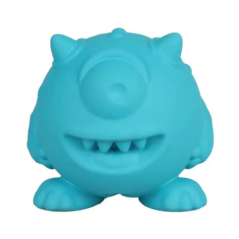 Blue monster-shaped dog chew toy on a white background, made from durable non-toxic rubber, perfect for dental health, teething relief, and interactive play for puppies and adult dogs, PawVortex USA.