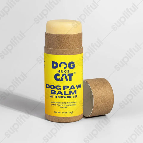 Dog paw balm with shea butter on a gray background.