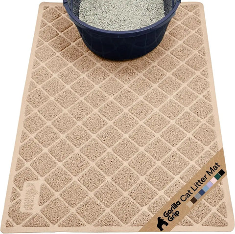 Full top-down view of a beige Gorilla Grip cat litter mat placed under a navy litter box