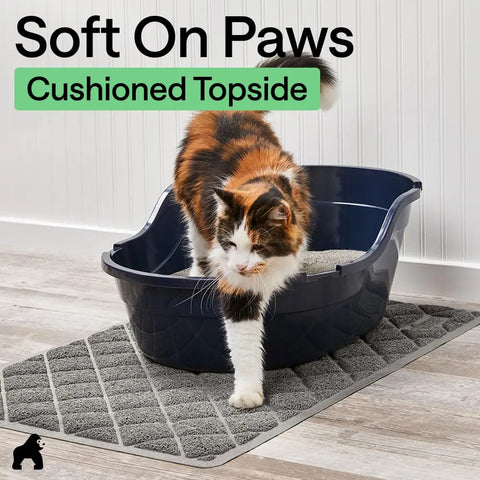 Gorilla Grip soft-on-paws cushioned cat litter trapping mat placed under a blue litter box with cat