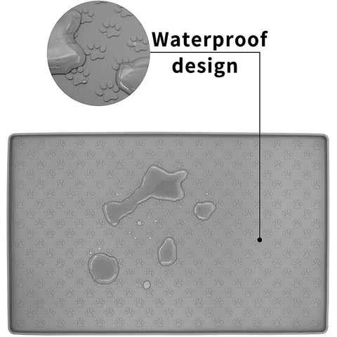Gray waterproof pet mat with paw print design showing repelled water.