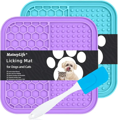 Purple and teal pet slow feeder licking mats featuring a blue silicone spatula.