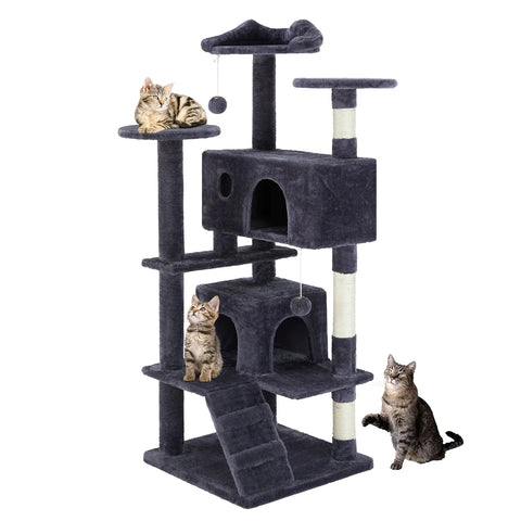 Multi-level Deep blue cat tree tower with condos, scratching posts, ladders, and perches featuring multiple tabby cats playing.