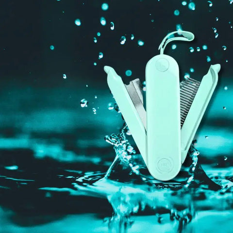 Multi-tool with comb and knife blade emerging from water on a dark background