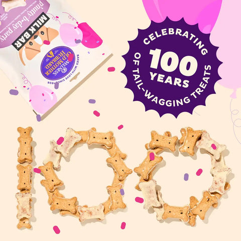Dog biscuits arranged to spell out the number 100, celebrating 100 years of Old Mother Hubbard dog treats.