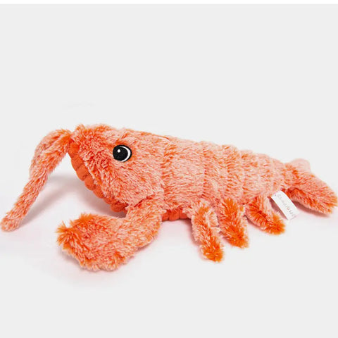 Orange plush lobster toy on a light grey background, soft and safe for cats