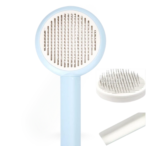 Pet grooming brush with blue handle and white bristles on a white background