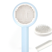 Pet grooming brush with blue handle and white bristles on a white background