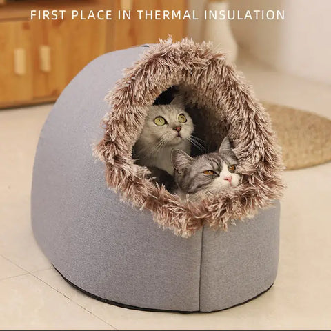 Portable plush pet bed with fleece interior and cave design.