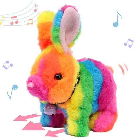 Colorful rainbow-striped electronic plush bunny rabbit toy with a collar bell
