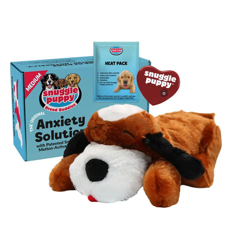 Snuggle Puppy Breed Buddies anxiety solution kit featuring a brown and white mutt plush toy with black ears.