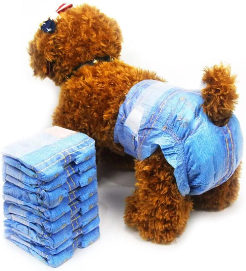 Stack of blue pet diapers next to a dog modeling a denim-style diaper.