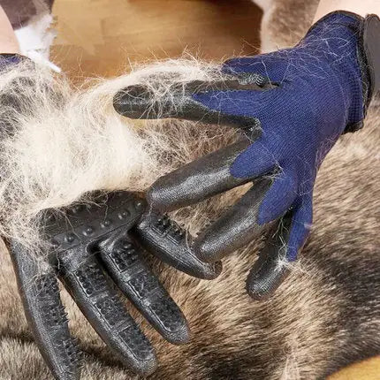 Textured grooming gloves actively capturing and removing loose hair from a dog's coat