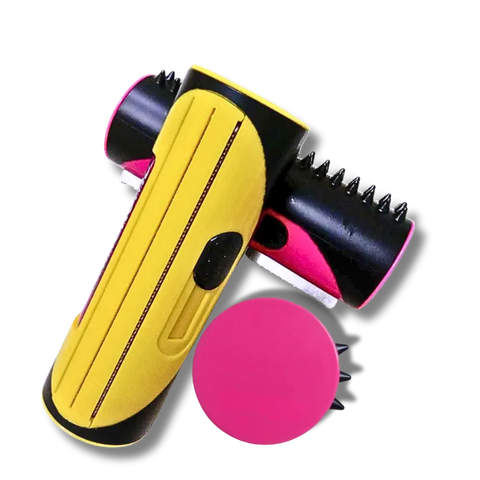 Yellow and pink grooming tool on a white background