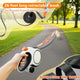 A dog walking on a park path with a 26-foot (8m) long retractable leash made of durable nylon webbing.