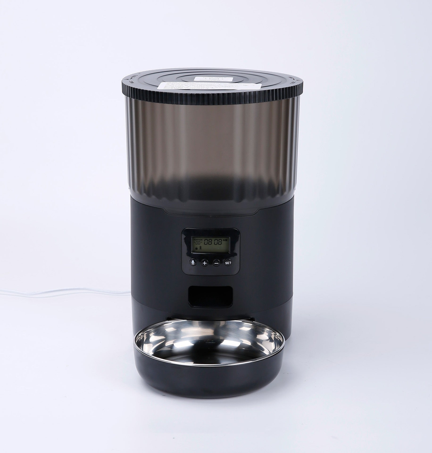 Black pet feeder with a digital display on a white background