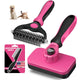 Pink and black pet grooming brush set with packaging on a white background
