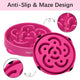 Close-up of the anti-slip rubber feet and internal maze design of a pink slow feeder dog bowl.