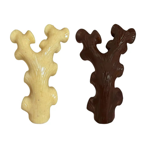 Smooth back view of the cream and dark brown antler-shaped hard nylon dog chew toys.
