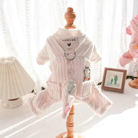Baby outfit on mannequin with 'Forever' label against white curtain.