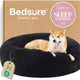 Bedsure black calming donut dog bed featuring a plush faux fur round design with a Shiba Inu dog resting inside.