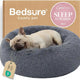 Bedsure dark grey round plush dog bed displayed with a French bulldog sleeping inside.