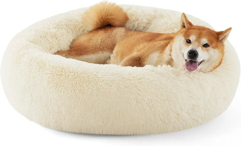 Bedsure ivory beige plush donut dog bed featuring a smiling Shiba Inu resting inside the soft padded edges.