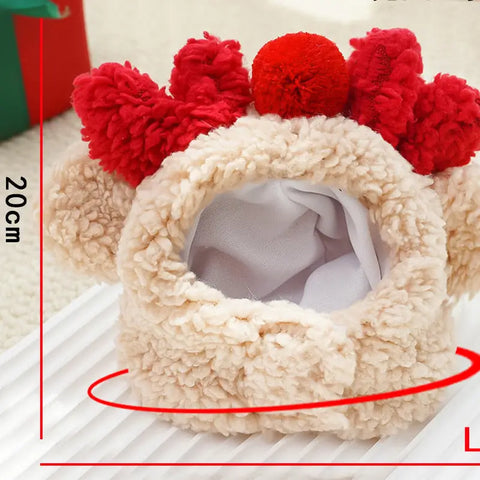 Beige headband with red floral decorations on white surface.