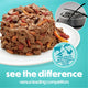 Close-up of Beneful IncrediBites wet dog food showing real chunks of meat and veggies versus a competitor's pate.