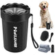 Black portable dog paw cleaner cup with matching grooming brush, towels, and toothbrush set.