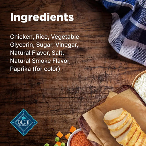 List of healthy ingredients for Blue Buffalo Nudges including chicken, duck, and natural flavors on a wooden background.