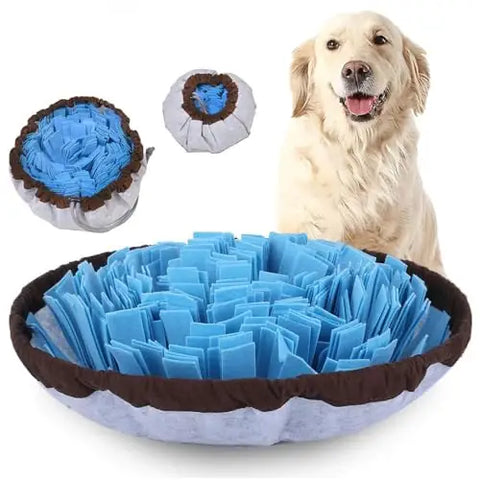 Adjustable blue felt dog snuffle mat shown fully expanded and cinched into a bowl shape next to a Golden Retriever.