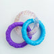 Durable blue, purple, and clear glitter interactive teething rings toy for puppies