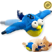 Cat playing with a blue and yellow bird-shaped plush toy on a white background