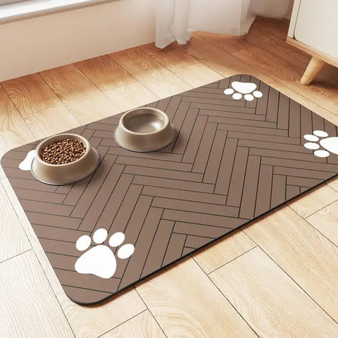 Coffee brown herringbone pattern pet food mat with two bowls and white paw accents.