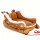 Brown reindeer-shaped pet bed with white fur trim.