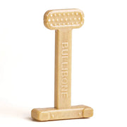 Professional studio shot of a tan Bullibone nylon dog toy isolated on white.