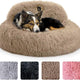Fluffy round calming dog bed in tan faux fur with color option swatches